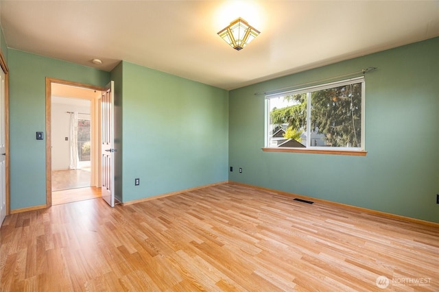 2460 Pine Dr, Ferndale, WA 98248 - unfurnished room with wood finished floors