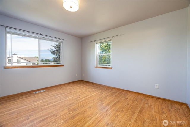 2460 Pine Dr, Ferndale, WA 98248 - empty room with light wood-type flooring and baseboards