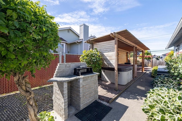 2460 Pine Dr, Ferndale, WA 98248 - view of patio / terrace with a hot tub