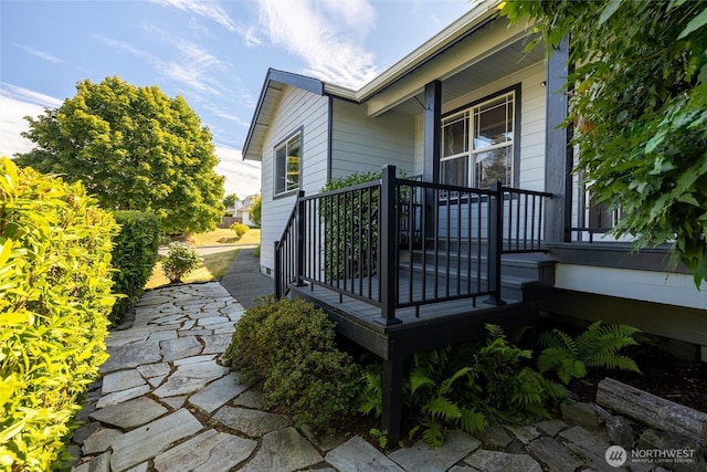 2460 Pine Dr, Ferndale, WA 98248 - view of side of home featuring covered porch