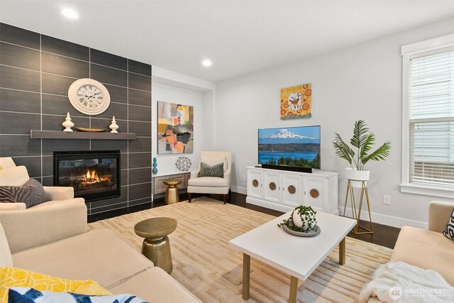 305 Field Pl SE, Renton, WA 98059 - living area with a tile fireplace, recessed lighting, and wood finished floors