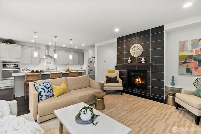 305 Field Pl SE, Renton, WA 98059 - living room with recessed lighting and a tiled fireplace