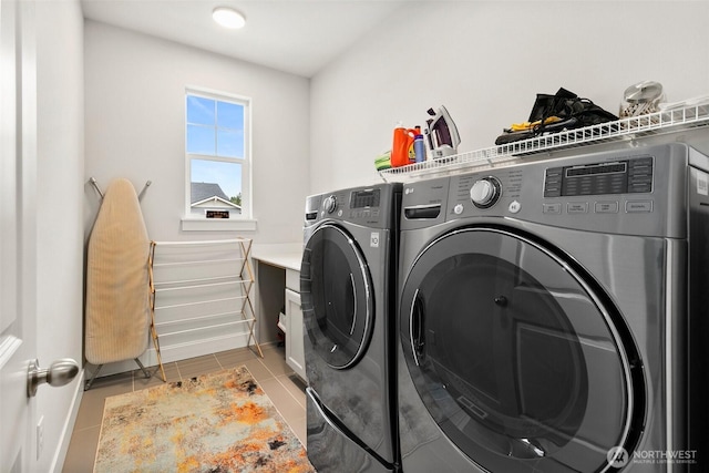 305 Field Pl SE, Renton, WA 98059 - laundry room featuring separate washer and dryer and light tile patterned floors