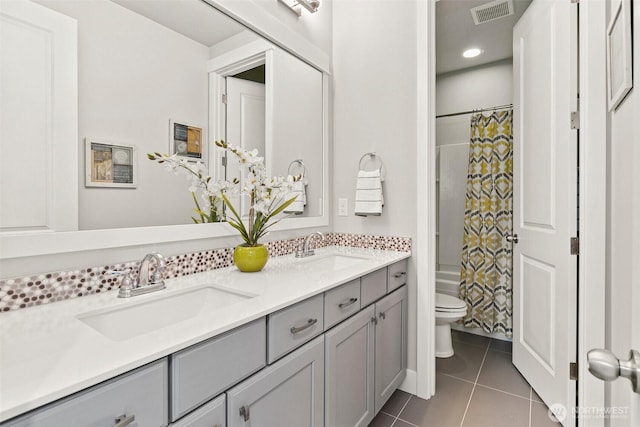 305 Field Pl SE, Renton, WA 98059 - full bath featuring double vanity, tile patterned flooring, and shower / tub combo with curtain