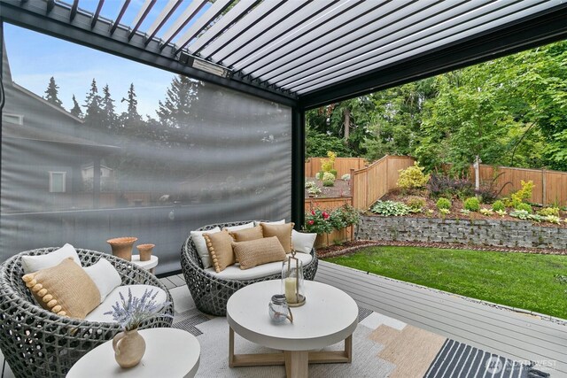 305 Field Pl SE, Renton, WA 98059 - fenced backyard featuring an outdoor hangout area, a wooden deck, and a pergola
