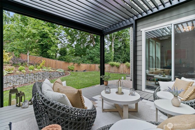 305 Field Pl SE, Renton, WA 98059 - fenced backyard featuring a deck, a pergola, and an outdoor hangout area
