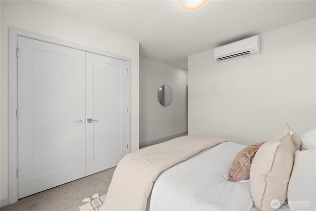8511B 13th Ave NW, Seattle, WA 98117 - bedroom with a wall mounted air conditioner, light colored carpet, and a closet