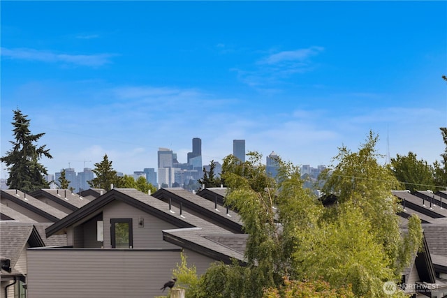 8511B 13th Ave NW, Seattle, WA 98117 - view of property exterior with roof with shingles
