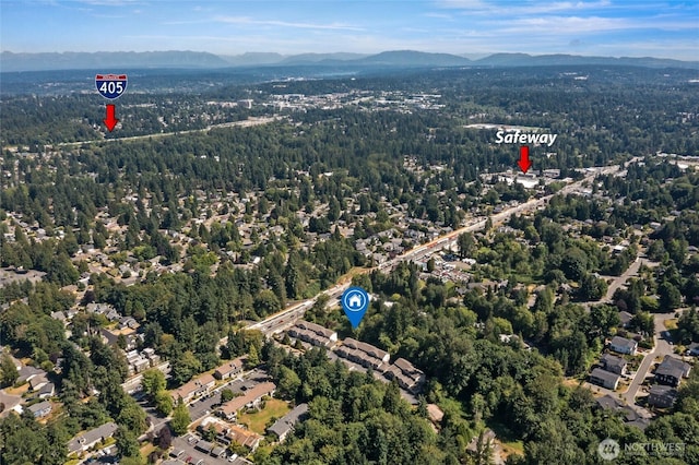 14335 Simonds Rd NE Unit A305, Kirkland, WA 98034 - aerial view of property and surrounding area with a forest