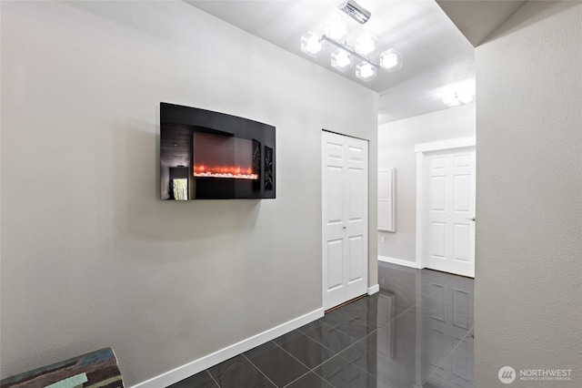 14335 Simonds Rd NE Unit A305, Kirkland, WA 98034 - hall with baseboards and granite floors