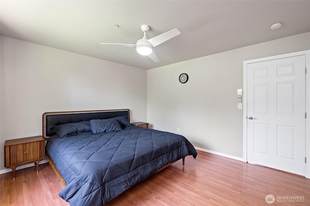 14335 Simonds Rd NE Unit A305, Kirkland, WA 98034 - bedroom with wood finished floors and a ceiling fan
