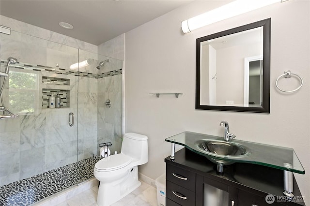 14335 Simonds Rd NE Unit A305, Kirkland, WA 98034 - full bathroom featuring a shower stall, vanity, and marble look tile flooring