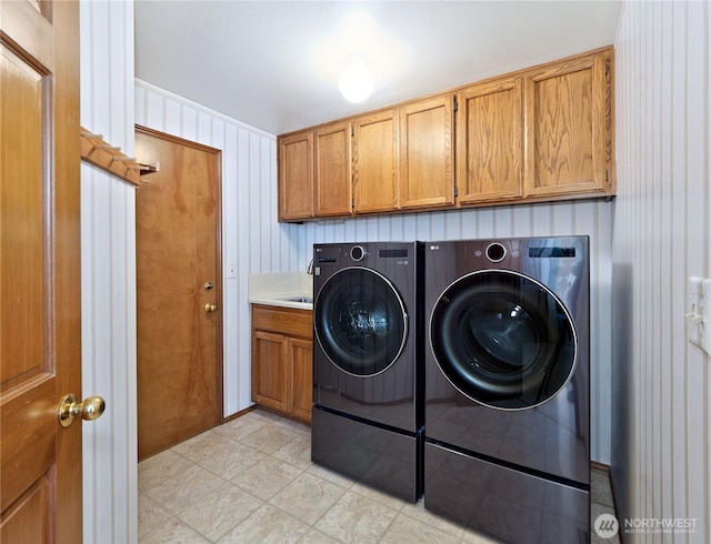 22019 NE 26th Pl, Sammamish, WA 98074 - laundry room featuring cabinet space and washer and dryer