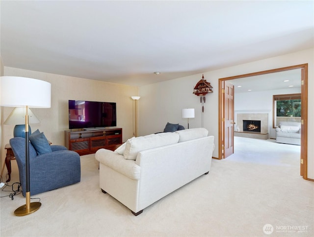 22019 NE 26th Pl, Sammamish, WA 98074 - carpeted living room featuring a lit fireplace