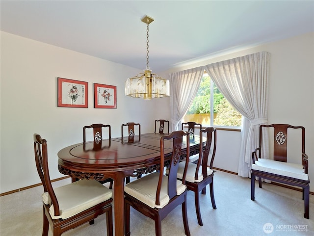 22019 NE 26th Pl, Sammamish, WA 98074 - dining space featuring light carpet and a chandelier