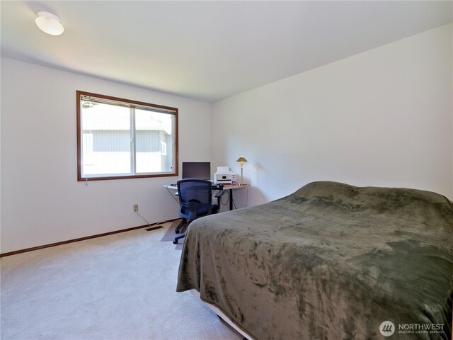 22019 NE 26th Pl, Sammamish, WA 98074 - bedroom featuring light carpet and baseboards