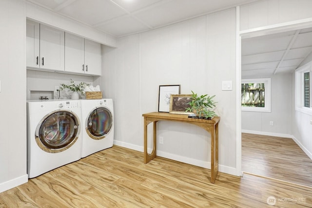 8410 Cimarron Way, Maple Falls, WA 98266 - washroom with cabinet space, light wood-style floors, and washing machine and dryer