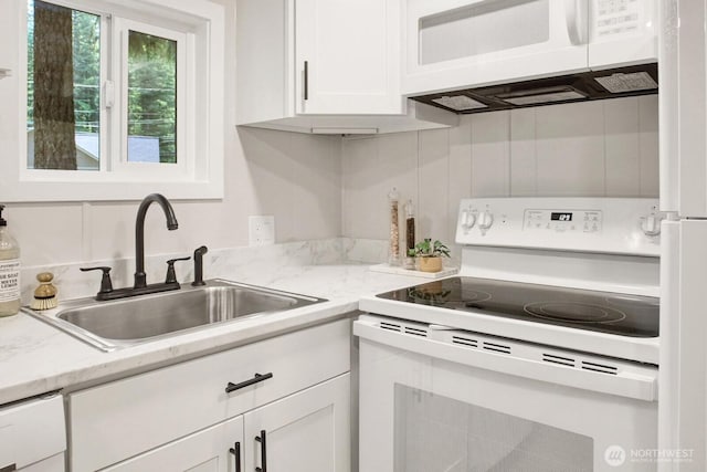 8410 Cimarron Way, Maple Falls, WA 98266 - kitchen with white appliances and white cabinets