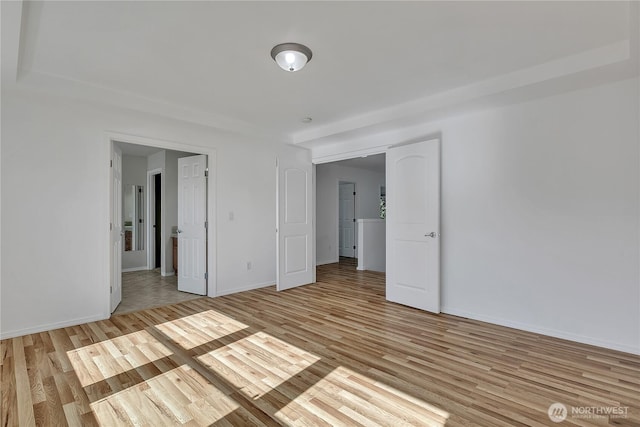 7003 Radius Loop SE, Lacey, WA 98513 - spare room featuring light wood finished floors and baseboards
