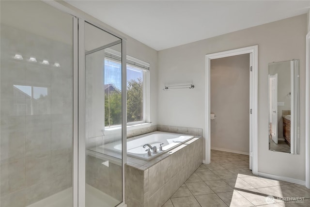 7003 Radius Loop SE, Lacey, WA 98513 - full bath featuring a garden tub, a shower stall, and tile patterned flooring