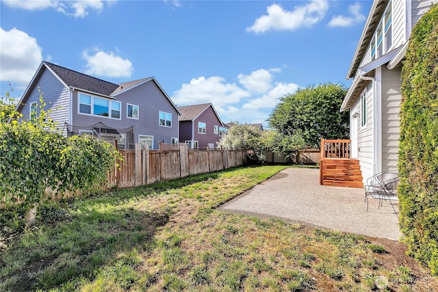 7003 Radius Loop SE, Lacey, WA 98513 - fenced backyard with a patio and a residential view