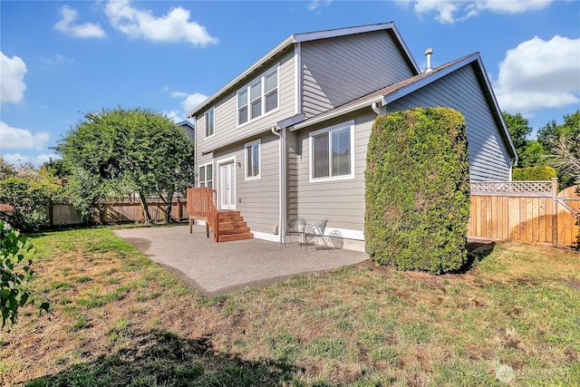 7003 Radius Loop SE, Lacey, WA 98513 - back of house featuring a patio and a fenced backyard
