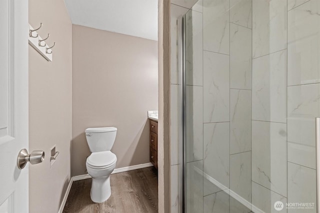 507 Madison Ave, Everett, WA 98203 - bathroom with vanity, wood finished floors, and a tile shower