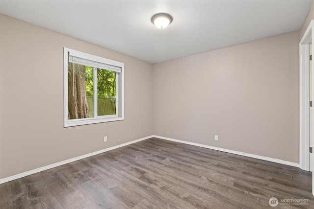 507 Madison Ave, Everett, WA 98203 - empty room featuring wood finished floors and baseboards