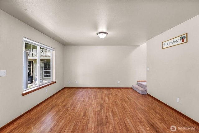 1422 Lincoln St, Bellingham, WA 98229 - spare room with wood finished floors and baseboards