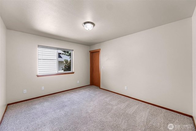 1422 Lincoln St, Bellingham, WA 98229 - empty room featuring carpet floors and baseboards