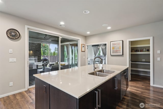 5624 S 344th Ct, Auburn, WA 98001 - kitchen with dark wood-type flooring, recessed lighting, light countertops, an island with sink, and dishwasher