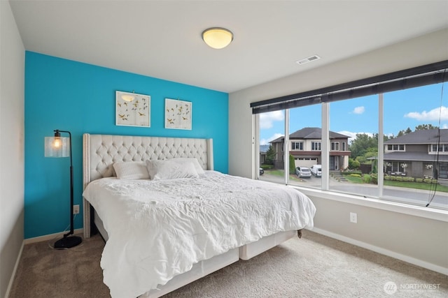 5624 S 344th Ct, Auburn, WA 98001 - carpeted bedroom featuring baseboards and a residential view