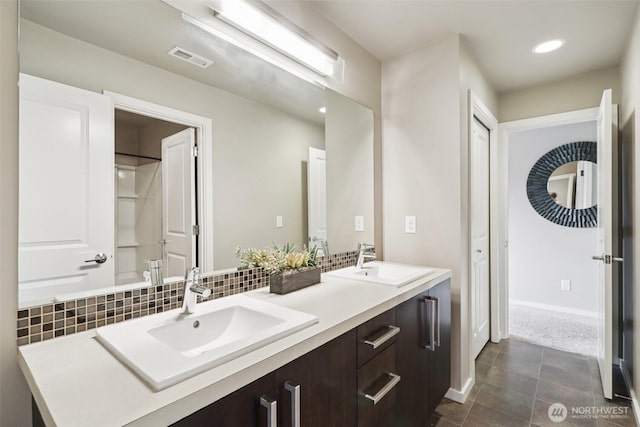 5624 S 344th Ct, Auburn, WA 98001 - bathroom with double vanity, recessed lighting, tile patterned flooring, and tasteful backsplash