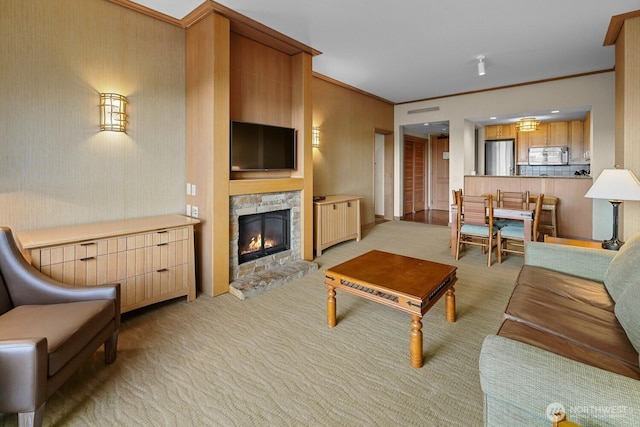 3600 Suncadia Trl Unit 1137, Cle Elum, WA 98922 - living room with light carpet, crown molding, and a fireplace