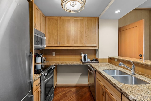 3600 Suncadia Trl Unit 1137, Cle Elum, WA 98922 - kitchen featuring stainless steel appliances, dark wood finished floors, tasteful backsplash, light stone countertops, and recessed lighting