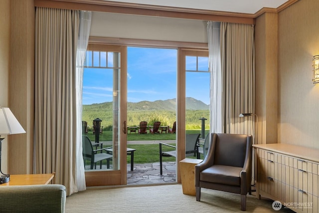 3600 Suncadia Trl Unit 1137, Cle Elum, WA 98922 - sitting room with a mountain view, carpet floors, and plenty of natural light