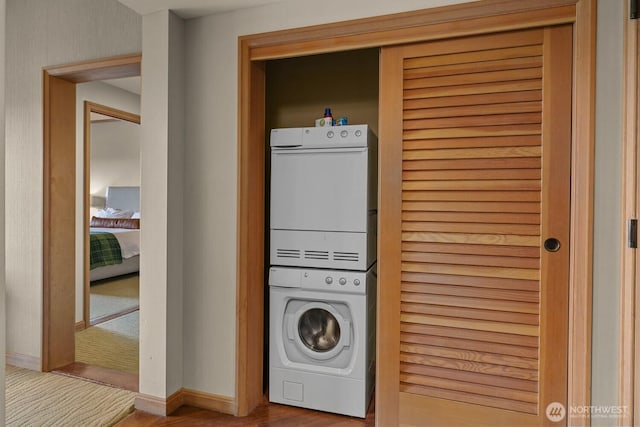 3600 Suncadia Trl Unit 1137, Cle Elum, WA 98922 - laundry area with stacked washer / drying machine and wood finished floors
