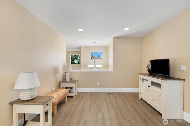 13034 SE 209th Ct, Kent, WA 98031 - living area with light wood-style floors, a chandelier, and recessed lighting