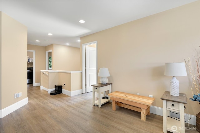 13034 SE 209th Ct, Kent, WA 98031 - sitting room with light wood-style floors and recessed lighting