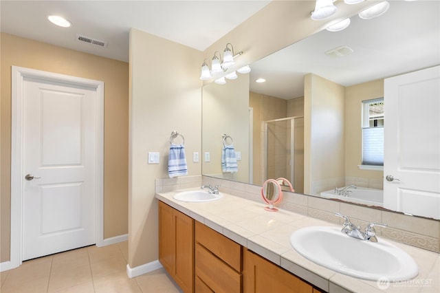 13034 SE 209th Ct, Kent, WA 98031 - full bath featuring a stall shower, double vanity, a bath, and tile patterned flooring