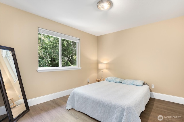 13034 SE 209th Ct, Kent, WA 98031 - bedroom featuring wood finished floors and baseboards