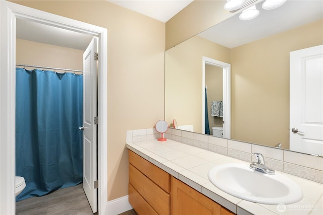 13034 SE 209th Ct, Kent, WA 98031 - bathroom featuring wood finished floors, vanity, and curtained shower