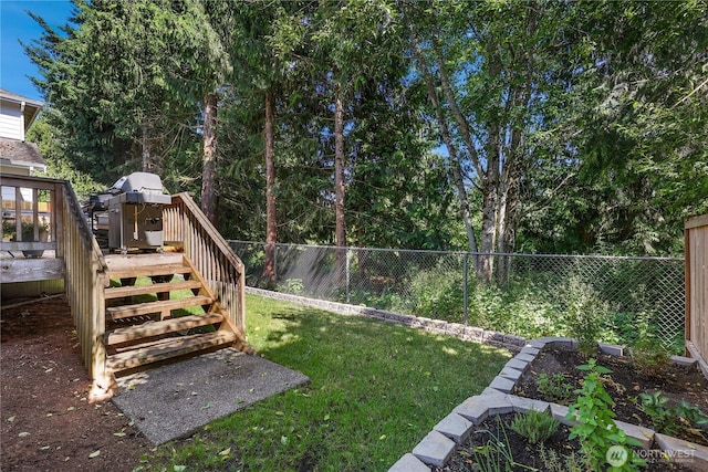 13034 SE 209th Ct, Kent, WA 98031 - fenced backyard with a deck and stairs