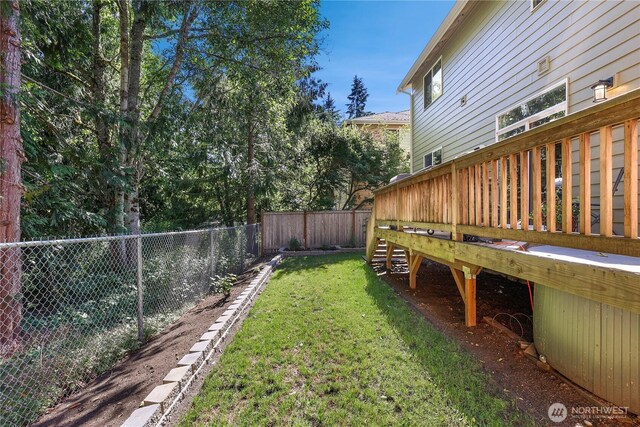 13034 SE 209th Ct, Kent, WA 98031 - fenced backyard featuring a deck