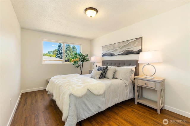 17114 SE 130th Ave, Renton, WA 98058 - bedroom featuring wood finished floors and a textured ceiling
