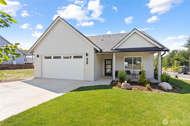 251 Sweet Gum Dr, Blaine, WA 98230 - view of front of home featuring a shingled roof, driveway, a garage, a porch, and a front lawn