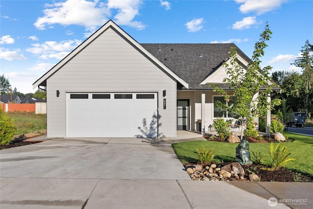 251 Sweet Gum Dr, Blaine, WA 98230 - view of front facade with driveway, an attached garage, a front yard, and a shingled roof