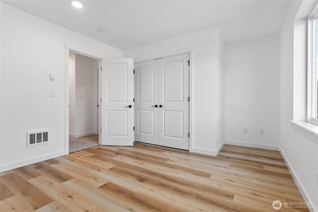 251 Sweet Gum Dr, Blaine, WA 98230 - unfurnished bedroom with light wood-type flooring, recessed lighting, and a closet