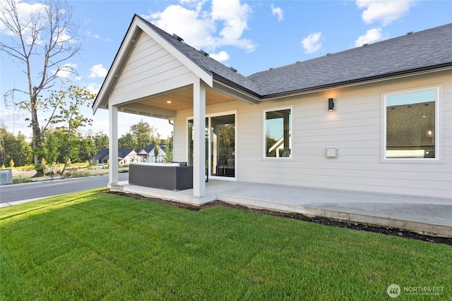 251 Sweet Gum Dr, Blaine, WA 98230 - rear view of property featuring a lawn and roof with shingles