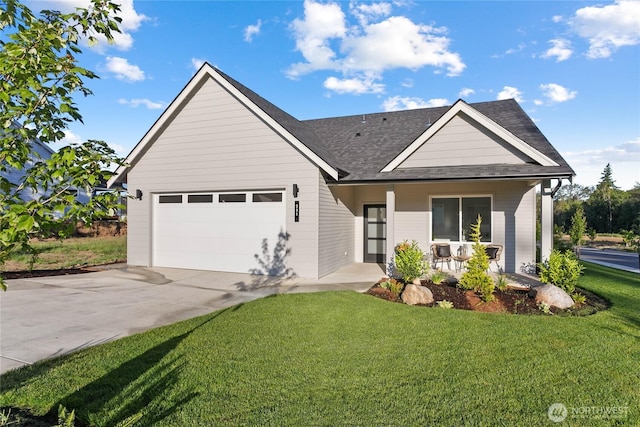 251 Sweet Gum Dr, Blaine, WA 98230 - view of front of home with driveway, a front yard, an attached garage, roof with shingles, and covered porch